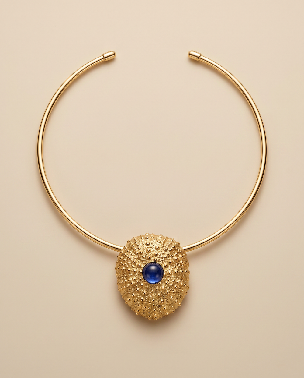 Tay Iolite set ‘Werner’s Shell’ pendant on torque