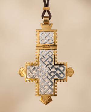 Tay Hinged Optic Cross pendant on leather strap