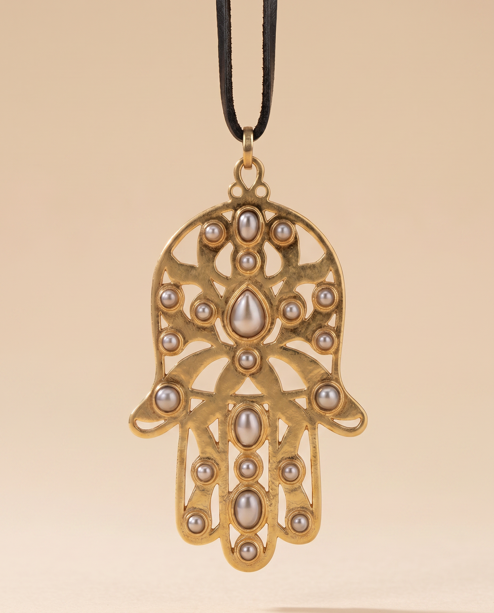 Tay Silver & Gold Hamsa pendant on leather strap